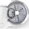 A close-up view of a food processor attachment with various blades. Produktbild-Vorschau