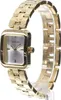 A gold-colored Guess women's watch is displayed on a clear stand against a white background. Anteprima dell’immagine prodotto