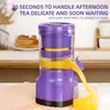 A purple and yellow electric juicer is shown dispensing orange juice into a glass. Podgląd zdjęcia produktu