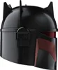 A black and red helmet, likely a collectible or toy, is shown against a white background. Anteprima dell’immagine prodotto