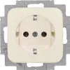 A close-up studio shot of a cream-colored electrical outlet mounted on a metal frame. Anteprima dell’immagine prodotto