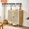 A natural rattan cabinet is shown in a living room setting with a lamp, a cup, and a basket of flowers on top. A robot vacuum cleaner is on the floor below. Anteprima dell’immagine prodotto
