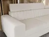 Close-up of a beige sofa in a room. Produktbild-Vorschau