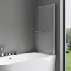A modern bathroom with a bathtub and a shower screen. Produktbild-Vorschau