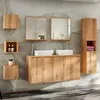 A modern bathroom vanity with two sinks, wooden cabinets, and mirrors, decorated with plants and toiletries. Produktbild-Vorschau