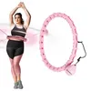A woman is shown exercising with a hula hoop, and the hula hoop is also shown separately. Podgląd zdjęcia produktu