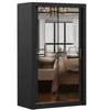 A black wardrobe with mirrored doors, reflecting a bedroom interior. Produktbild-Vorschau