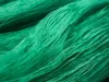 A close-up view of green netting. Produktbild-Vorschau