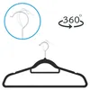 A black velvet hanger with a rotating hook and a diagram showing the hook's rotation. Produktbild-Vorschau