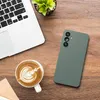 A top-down view of a desk with a laptop, coffee, and a phone case. Produktbild-Vorschau