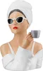 A bust of a woman wearing a white towel on her head, sunglasses, and a white robe, holding a gray coffee cup. Produktbild-Vorschau