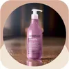 A bottle of Arkemusa SMOOTH smoothing conditioner is displayed in a circular frame with a blurred background. Náhľad obrázku produktu