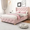 A pink upholstered bed with a tufted headboard and footboard, set in a bedroom with curtains and artwork on the wall. Produktbild-Vorschau