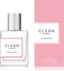 A bottle of Clean Classic Flower Fresh Eau de Parfum and its packaging are displayed side-by-side against a white background. Náhled obrázku produktu