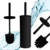 A collage of black toilet brushes and their holders, with water splashes in the background. Anteprima dell’immagine prodotto