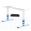 A white electric standing desk frame with a black control panel is shown on a grid background. Produktbild-Vorschau