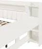 Close-up view of a white bed frame with a built-in shelf unit. Náhľad obrázku produktu