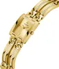 A close-up, angled view of a gold-colored Guess watch with a rectangular face and a link bracelet adorned with small clear stones. Náhled obrázku produktu