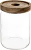 A clear studio shot of a glass jar with a wooden lid. Náhled obrázku produktu