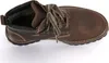 A top-down view of a brown leather boot with laces. Voir les images du produit