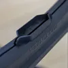Close-up of a black plastic latch on a product. Produktbild-Vorschau