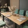 A dining table set in a modern dining room with chairs and table settings. Produktbild-Vorschau