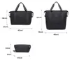 Schwarze Handgepäcktasche für Damen, 40 x 30 x 20 cm, mit Produktbild-Vorschau 7