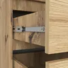 A close-up view of a wooden drawer with a metal slide mechanism. Produktbild-Vorschau