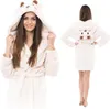 A woman wearing a white hooded bathrobe with bear-like features. Náhľad obrázku produktu