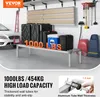 A garage or storage area with a shelving unit holding various storage containers and tools, next to a car. Produktbild-Vorschau