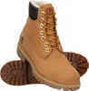 A pair of Timberland boots shown against a white background. Produktbild-Vorschau