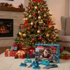 A Christmas tree with gifts underneath, and a Makita advent calendar and tools laid out on the floor. Anteprima dell’immagine prodotto