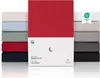 A product display of multiple fitted sheets in various colors, with one red sheet prominently featured in the center. Anteprima dell’immagine prodotto