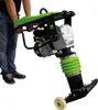 A person is holding a tamper compactor. Náhľad obrázku produktu