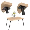 A coffee table with a vase of flowers on top, and close-up views of the table legs being attached to the underside of the table. Produktbild-Vorschau