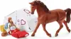 A toy horse and a girl figure with a tent and sleeping bag. Produktbild-Vorschau