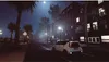 A street scene at night with a white car driving on the road. Produktbild-Vorschau