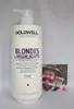 A large bottle of Goldwell Dualsenses Blondes & Highlights Anti-Yellow Shampoo is shown next to a small printed photo of a man. Produktbild-Vorschau