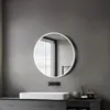 A modern bathroom vanity with a round illuminated mirror above a white rectangular sink. Anteprima dell’immagine prodotto