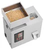 A stainless steel automatic particle weighing and filling machine is shown on a white background. Náhľad obrázku produktu