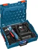 A blue toolbox containing a cordless drill and a charger. Voir les images du produit
