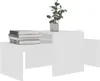 A white coffee table set with books and a plant on it, against a white background. Náhled obrázku produktu