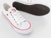 A pair of white low-top sneakers with red and blue accents, shown from a slightly elevated angle. The sole of one shoe is visible in the background. Produktbild-Vorschau