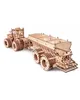 A wooden model of a tractor with a trailer, displayed against a white background. Náhled obrázku produktu