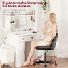 A woman applying makeup at a vanity table while sitting on a black office chair. Náhled obrázku produktu