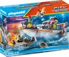 The image shows the packaging of a Playmobil City Action rescue boat playset, with a dramatic scene of rescue operations at sea. Produktbild-Vorschau