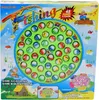 The image shows the packaging of a fishing game for children. The box features colorful illustrations of fish, a fishing rod, and children playing. The game board itself is visible in the center, with numerous small fish pieces. Náhľad obrázku produktu