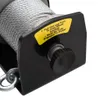 Close-up of a winch with a warning label and a control knob. Náhľad obrázku produktu