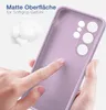 A hand is touching a purple phone case, highlighting its matte surface and soft grip. Produktbild-Vorschau