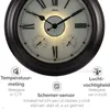 A close-up of a wall clock with integrated thermometer and hygrometer, with feature callouts. Produktbild-Vorschau
